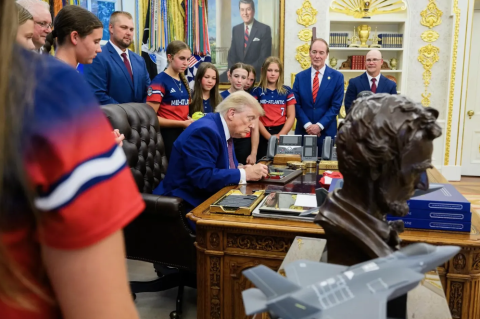 President Trump Signing a Game Ball